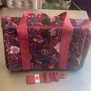Parkland Design and Manfacturing Atomic Floral Rose in a large duffel